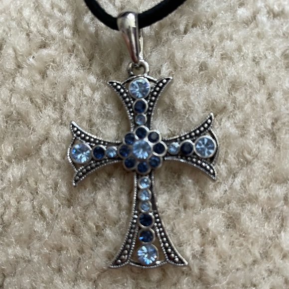 Lia Sophia Jewelry - NWT Lia Sophia necklace blue stone cross on a felt chain.